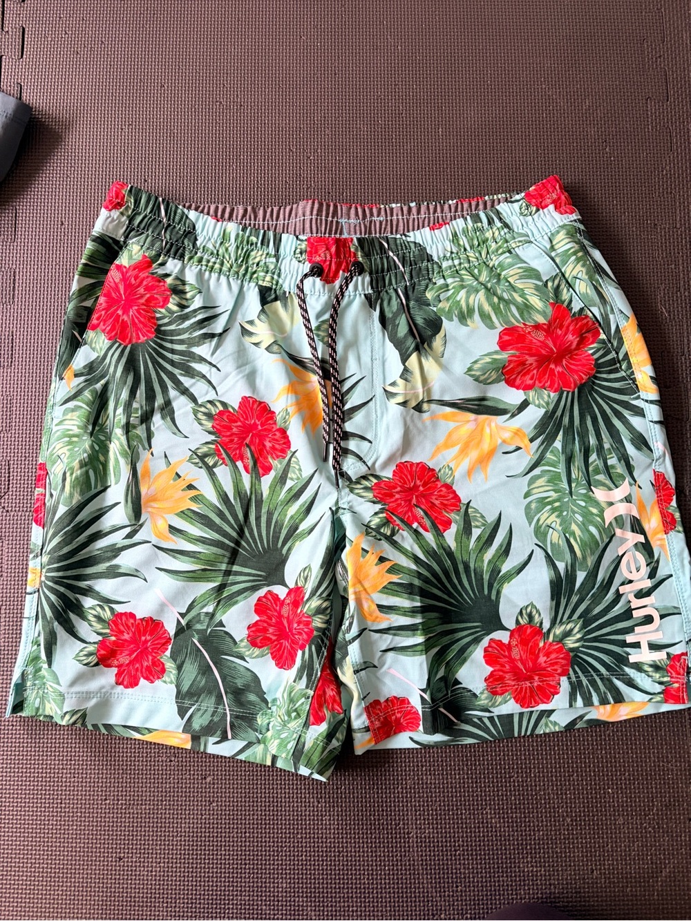 Hurley Green Tropical Floral Swim Shorts with Red Hibiscus